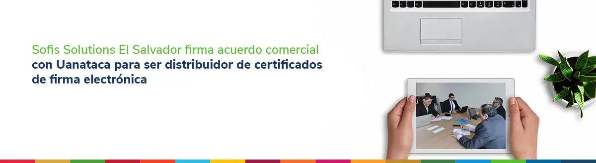 Personas reunidas firmando un acuerdo.